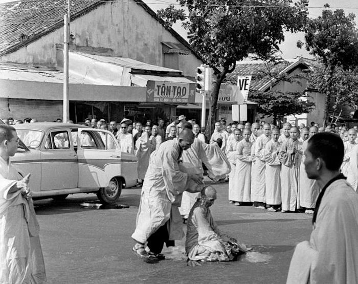Buddhist monk Quang Duc emerged from a car and sat in the center of the intersection while a younger monk poured gasolin