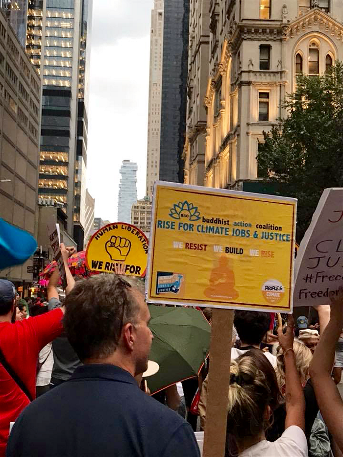 Hundreds of Buddhists join San Francisco climate march 2