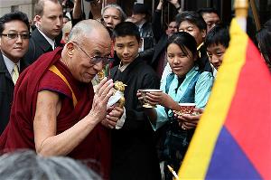 The Dalai Lama greeted by well-wishers